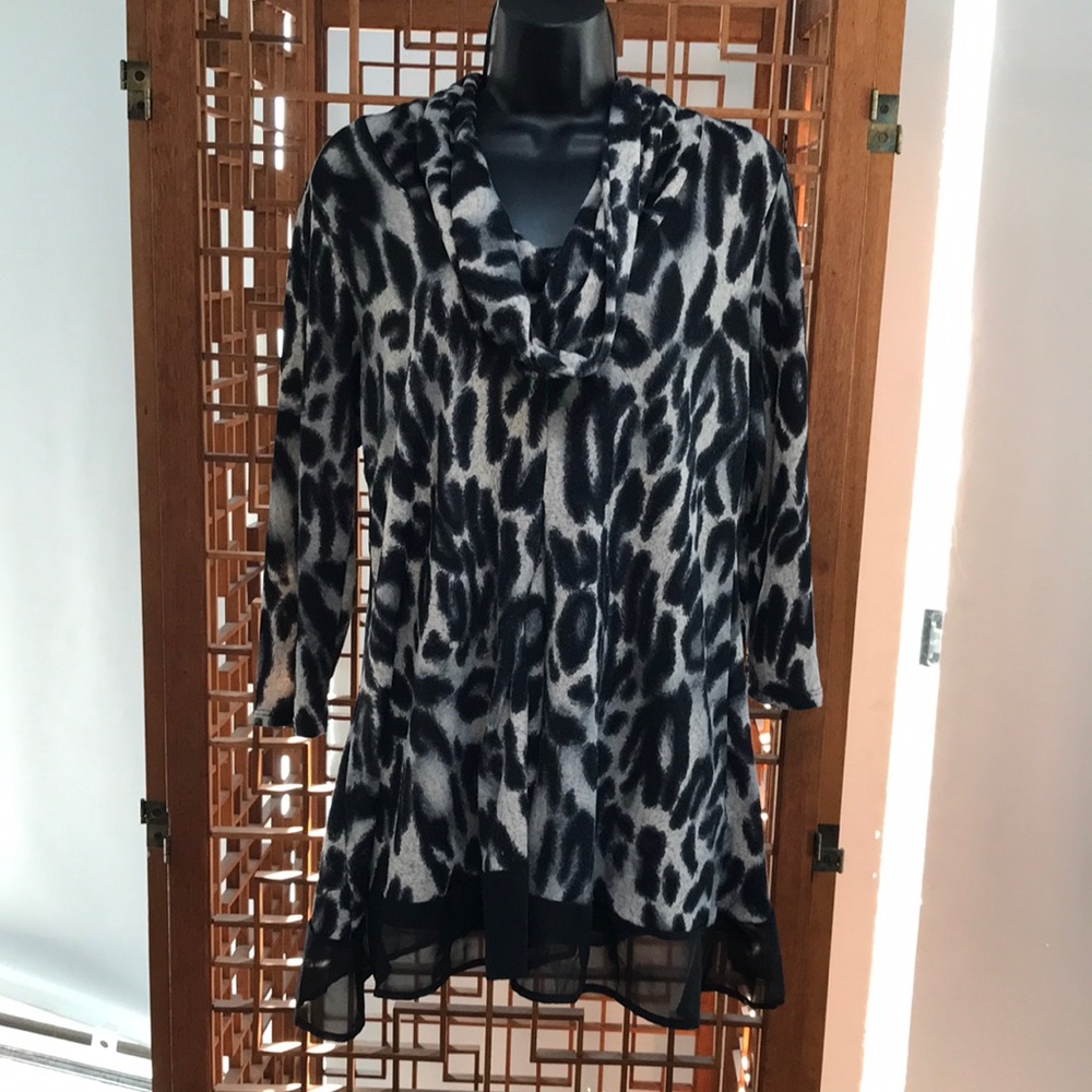 Dress Barn black and cream top with cowl neck and sheer bottom. Size L